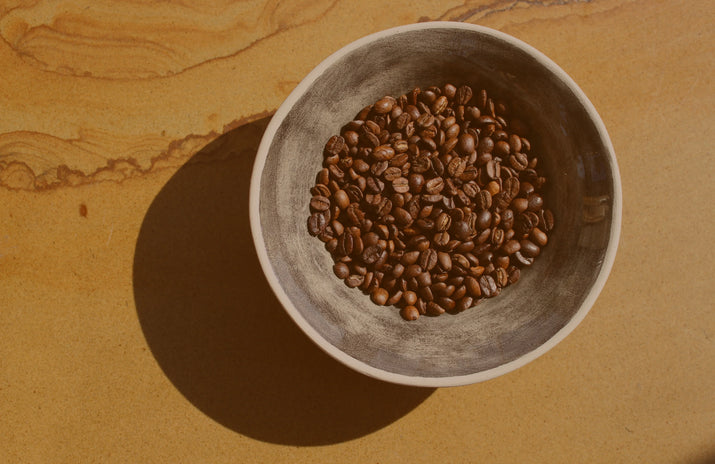 Coffee grinds on spoons